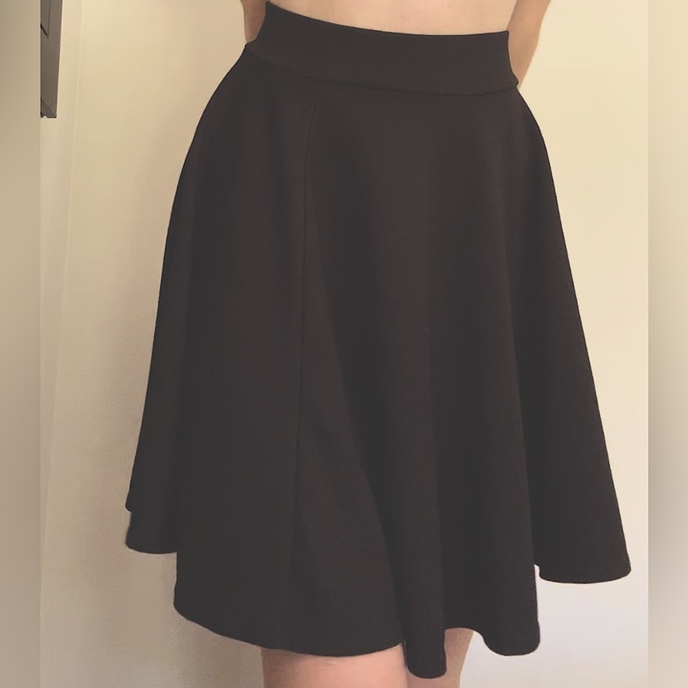 Black Amazon circle skirt, size small. Medium length
